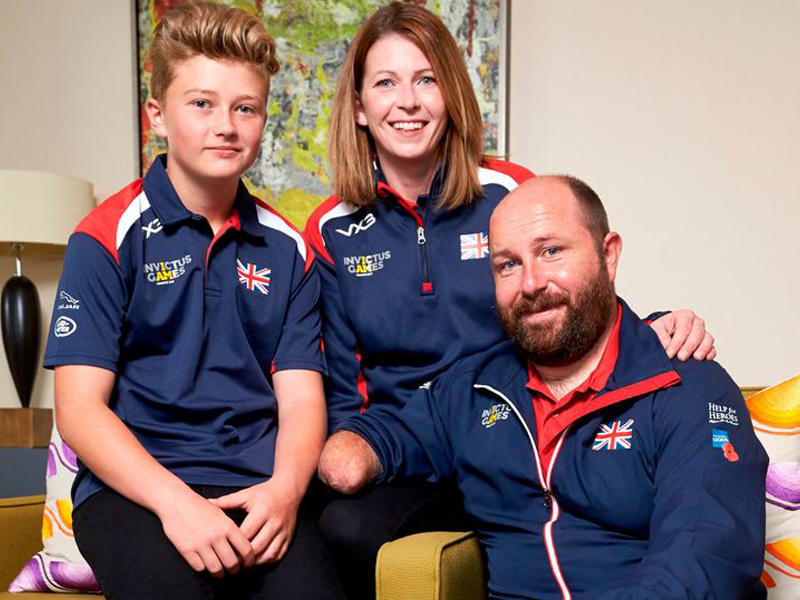 Dave (right) pictured with wife Becky and son Josh