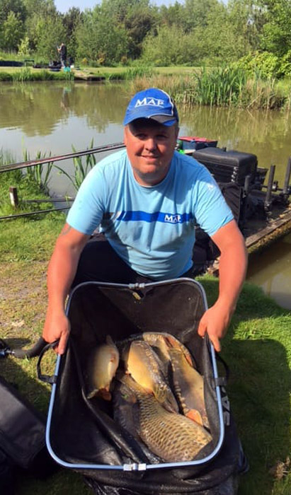 Jamie Hughes with part of his match-winning haul